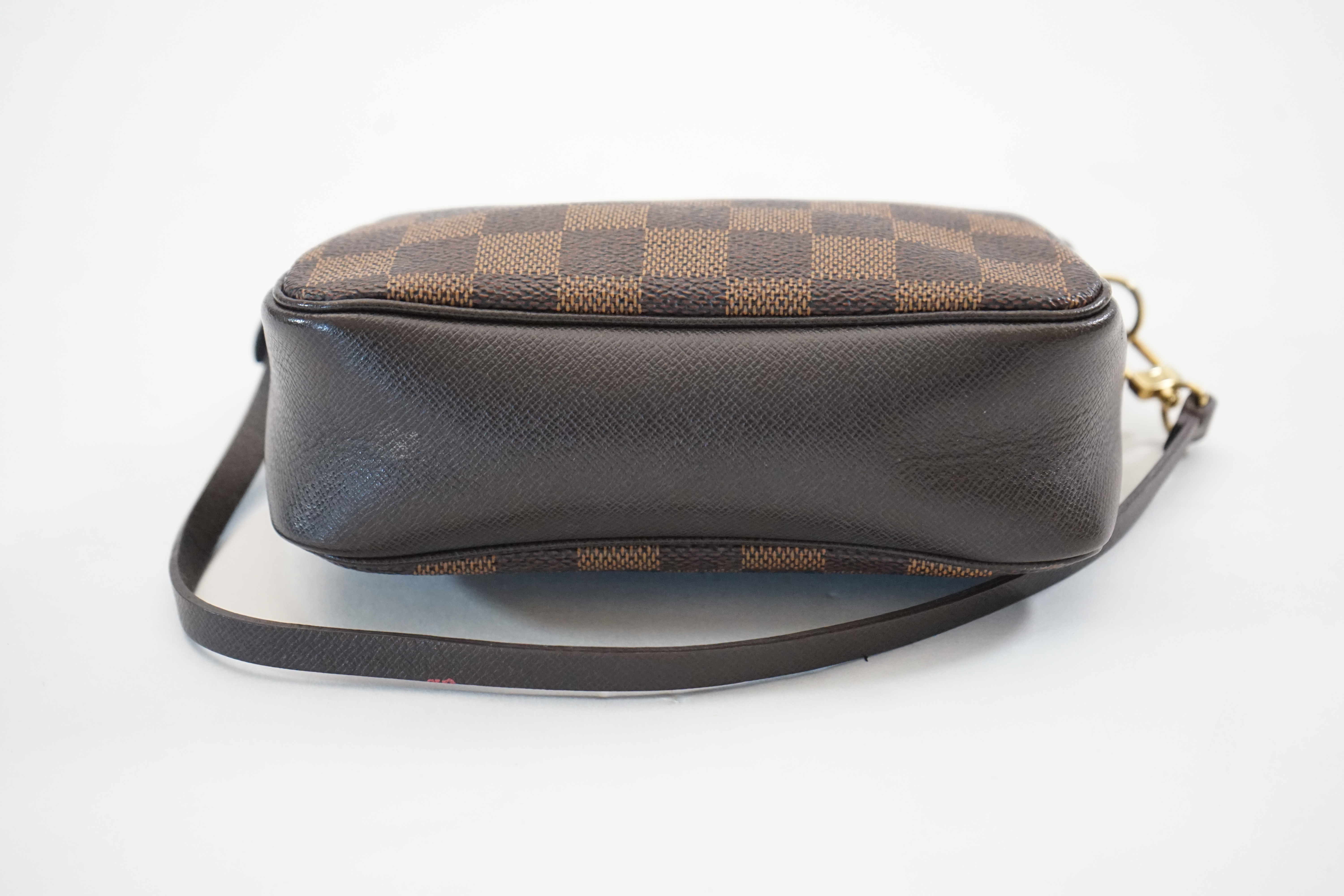 A Louis Vuitton Damier Ebene Pochette accessories bag, width 16cm, max depth 5cm, height 14cm